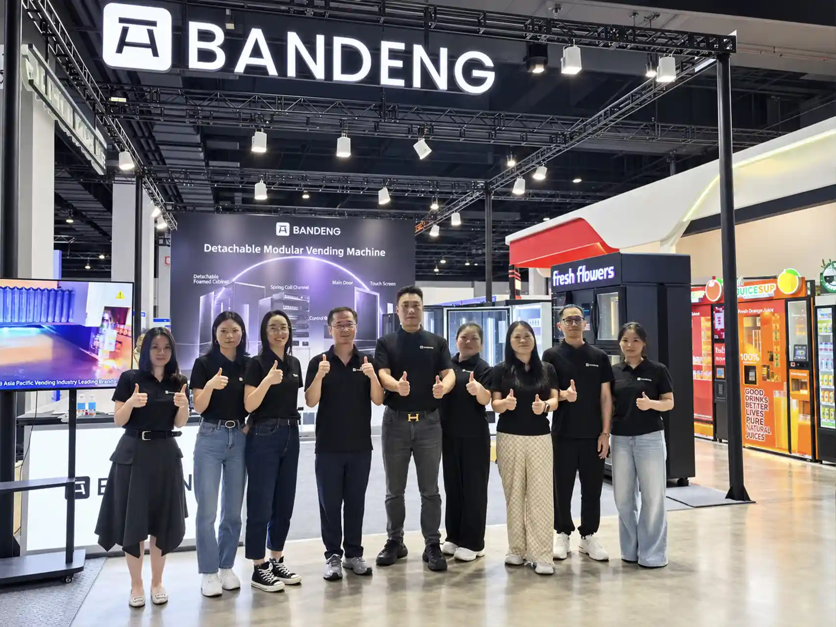 BANDENG team members at a vending exhibition in Malaysia
